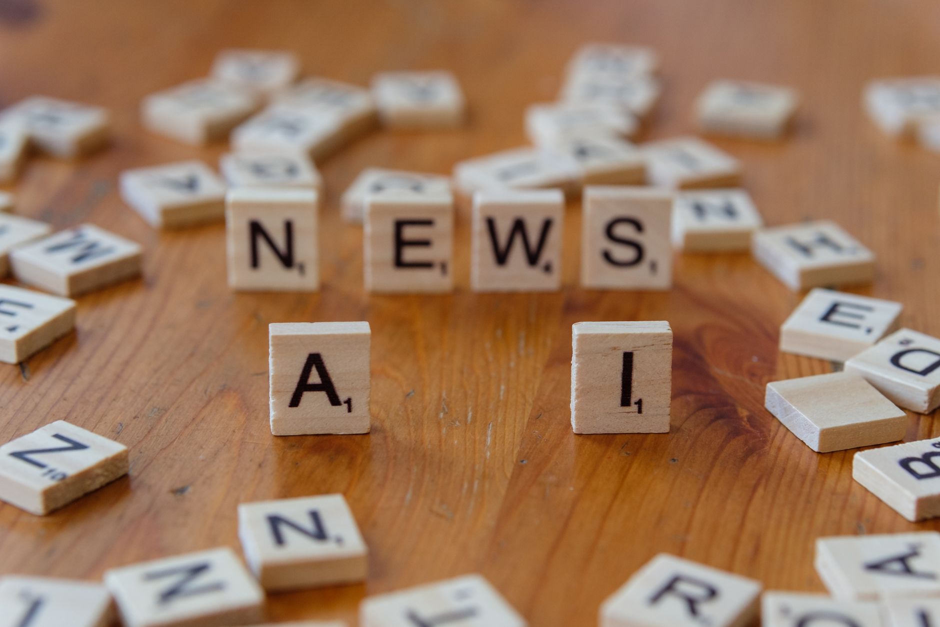 Wooden Scrabble tiles spelling 'AI' and 'NEWS' for a tech concept image. — Worauf achten bei der Registrierung im LuckyGem Ca